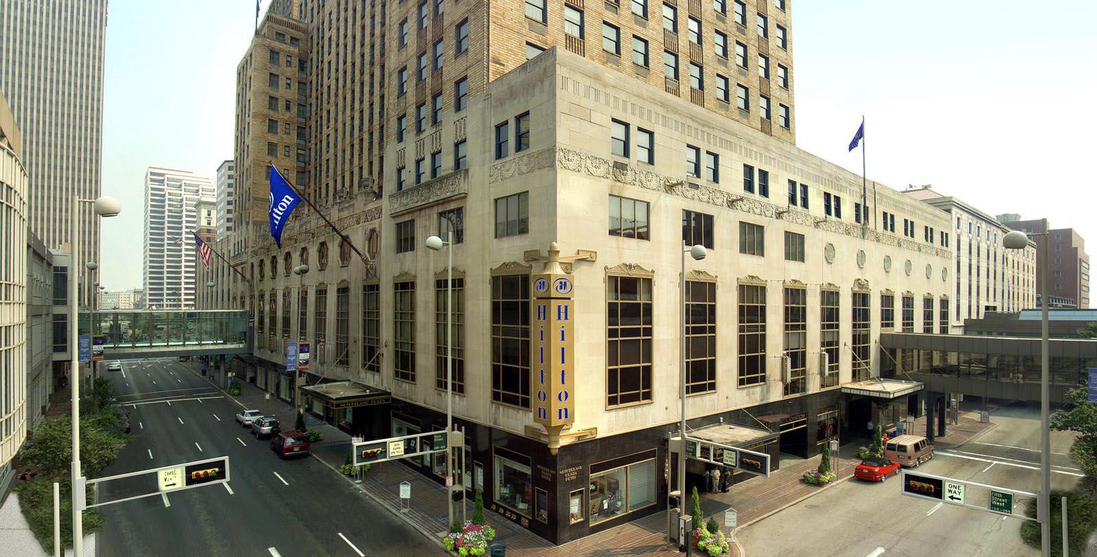a building with a flag on the corner
