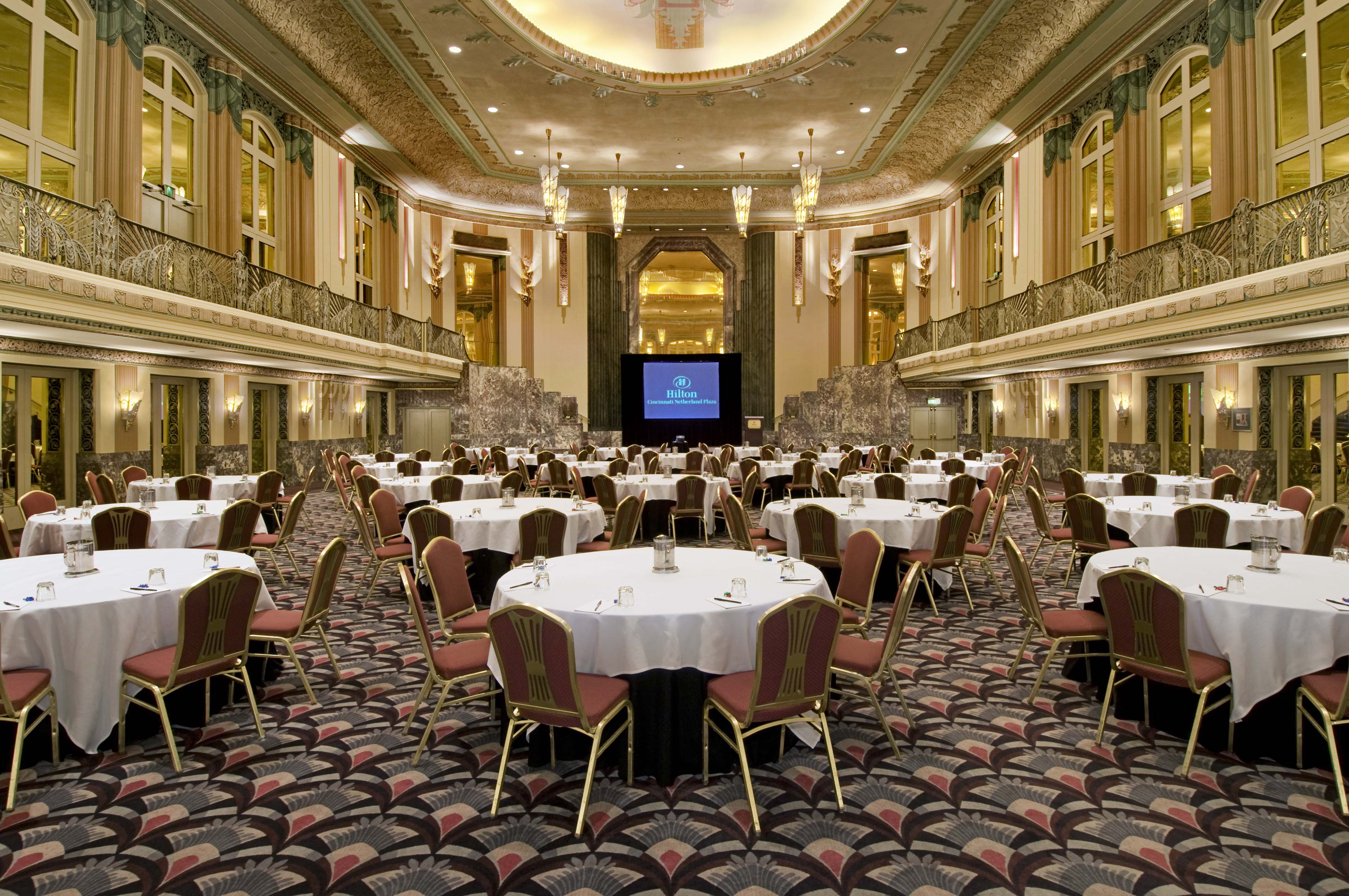 a large room with tables and chairs
