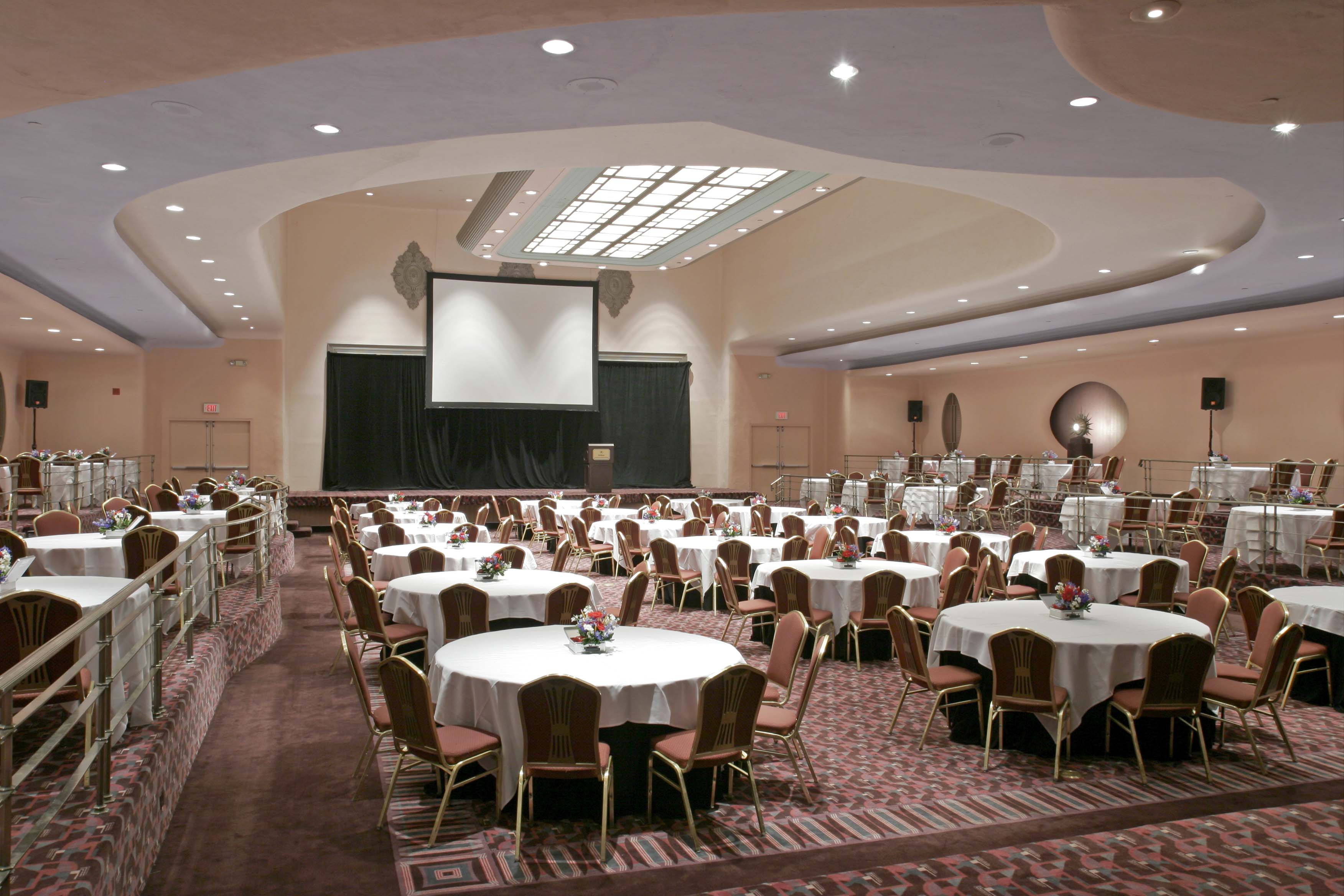 a room with tables and chairs
