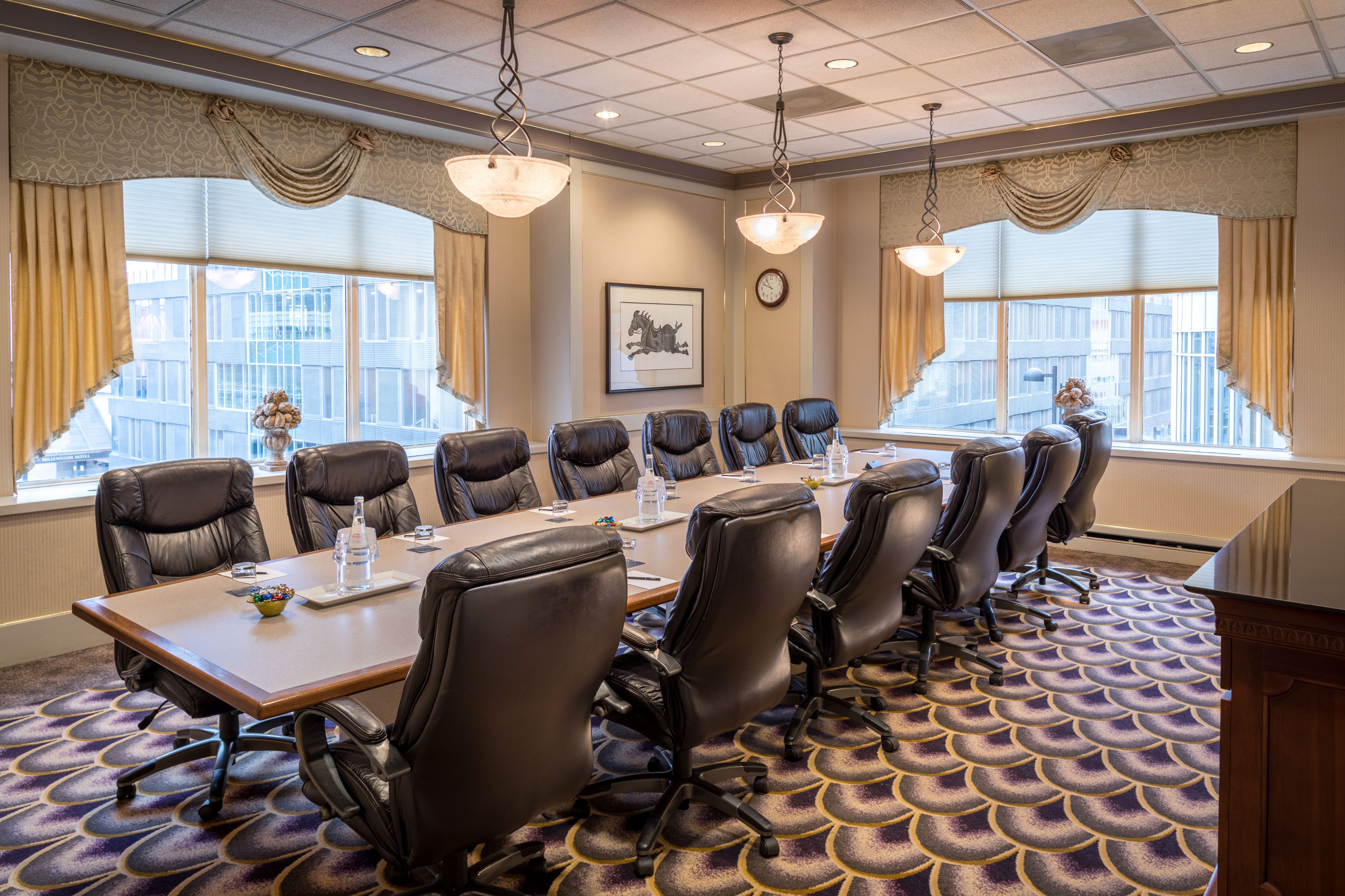 a conference room with chairs and tables