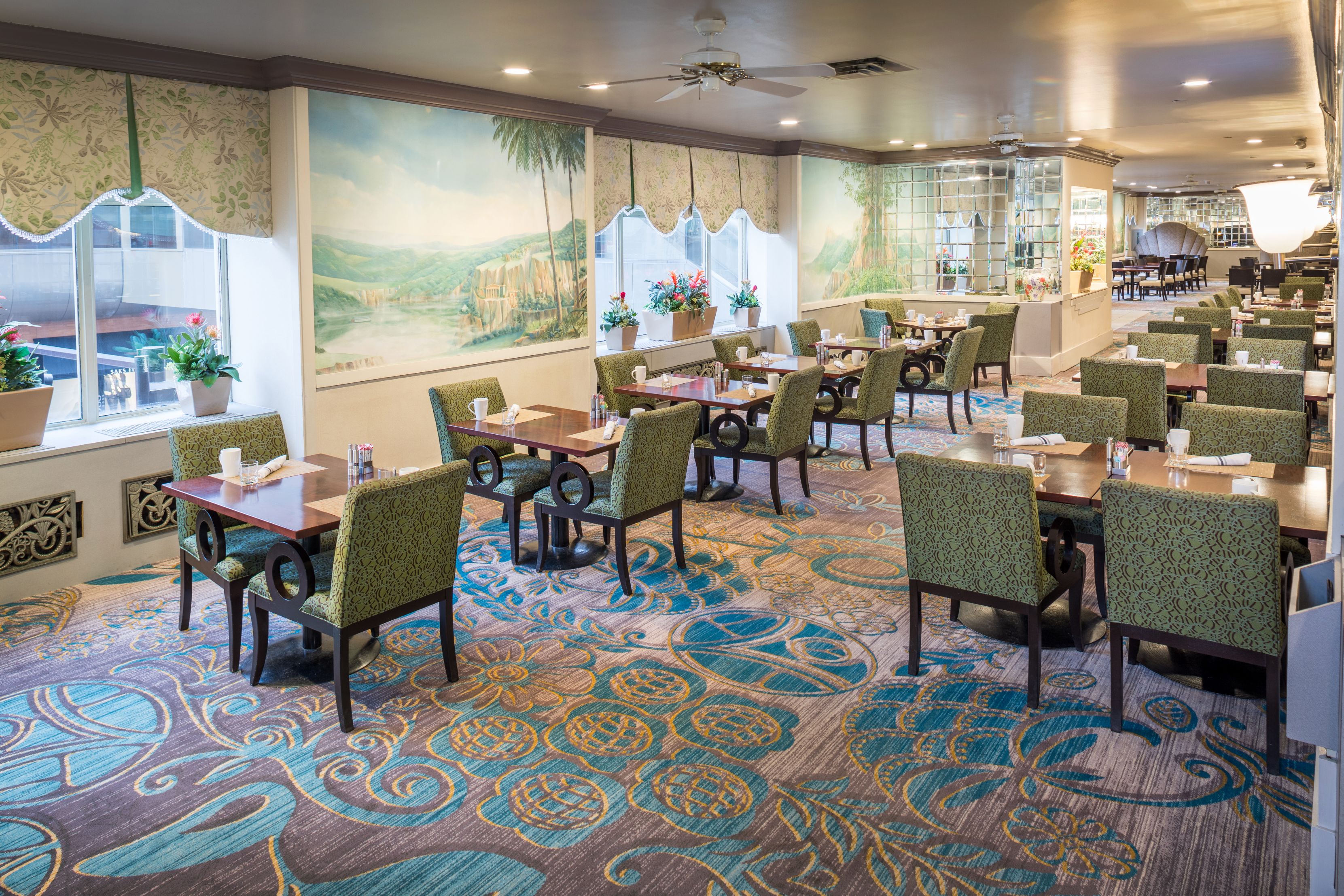 a room with tables and chairs
