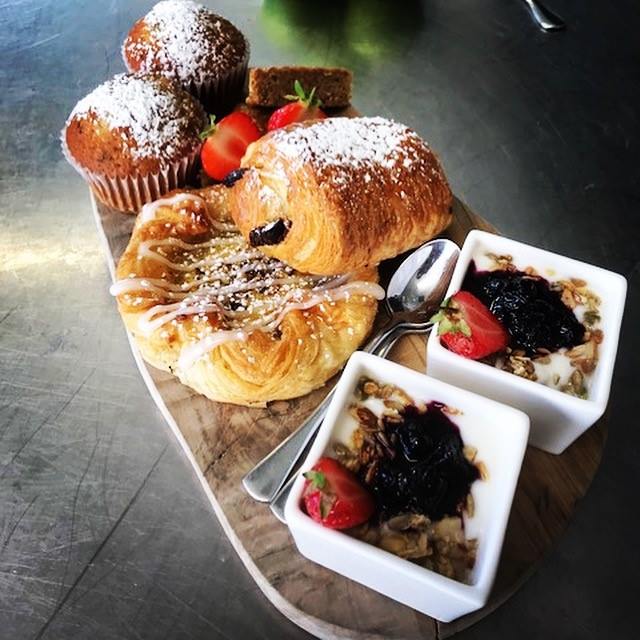 a plate of pastries and fruit