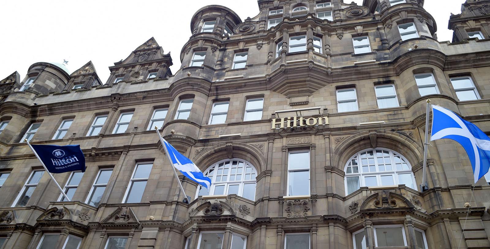 a building with a flag on the front