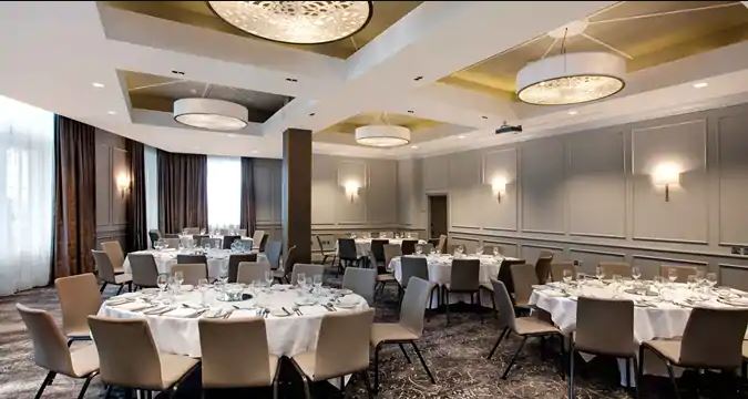 a room with tables and chairs