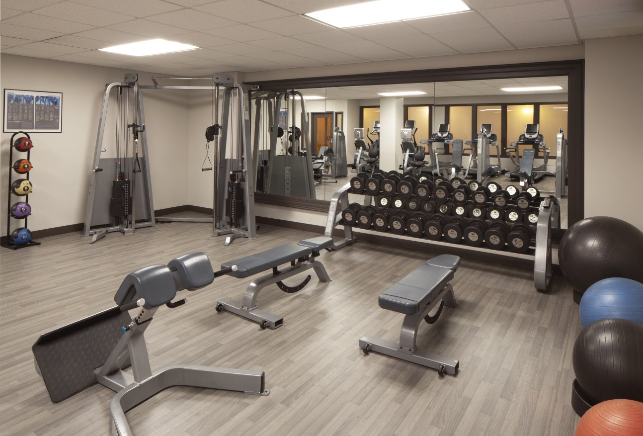 a gym with weights and equipment