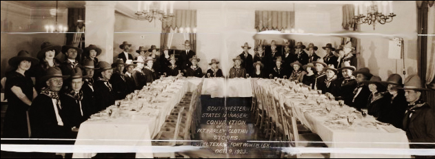 a group of people sitting at a table