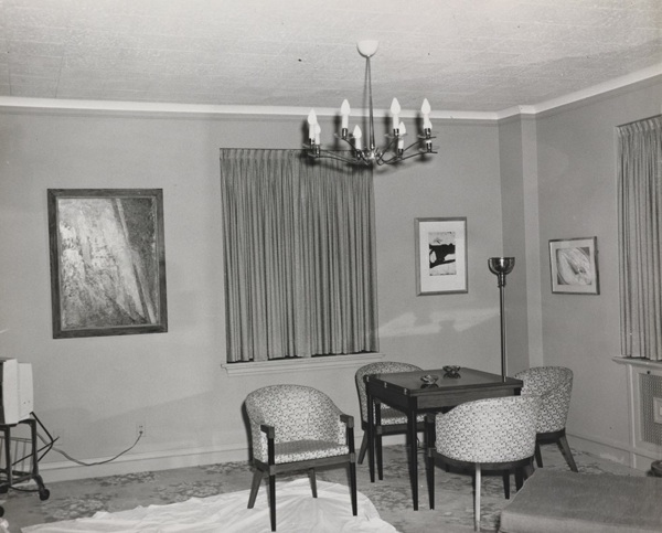 a room with a table and chairs