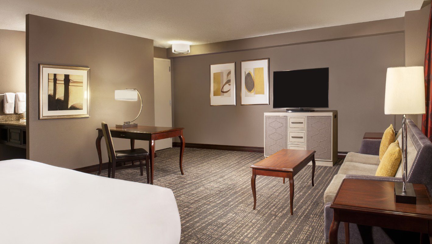 a room with a television and a table