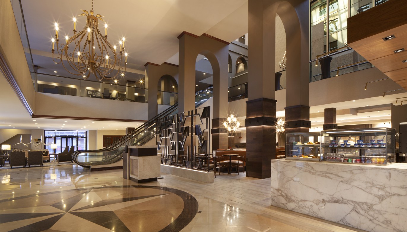 a large building with a staircase and escalator