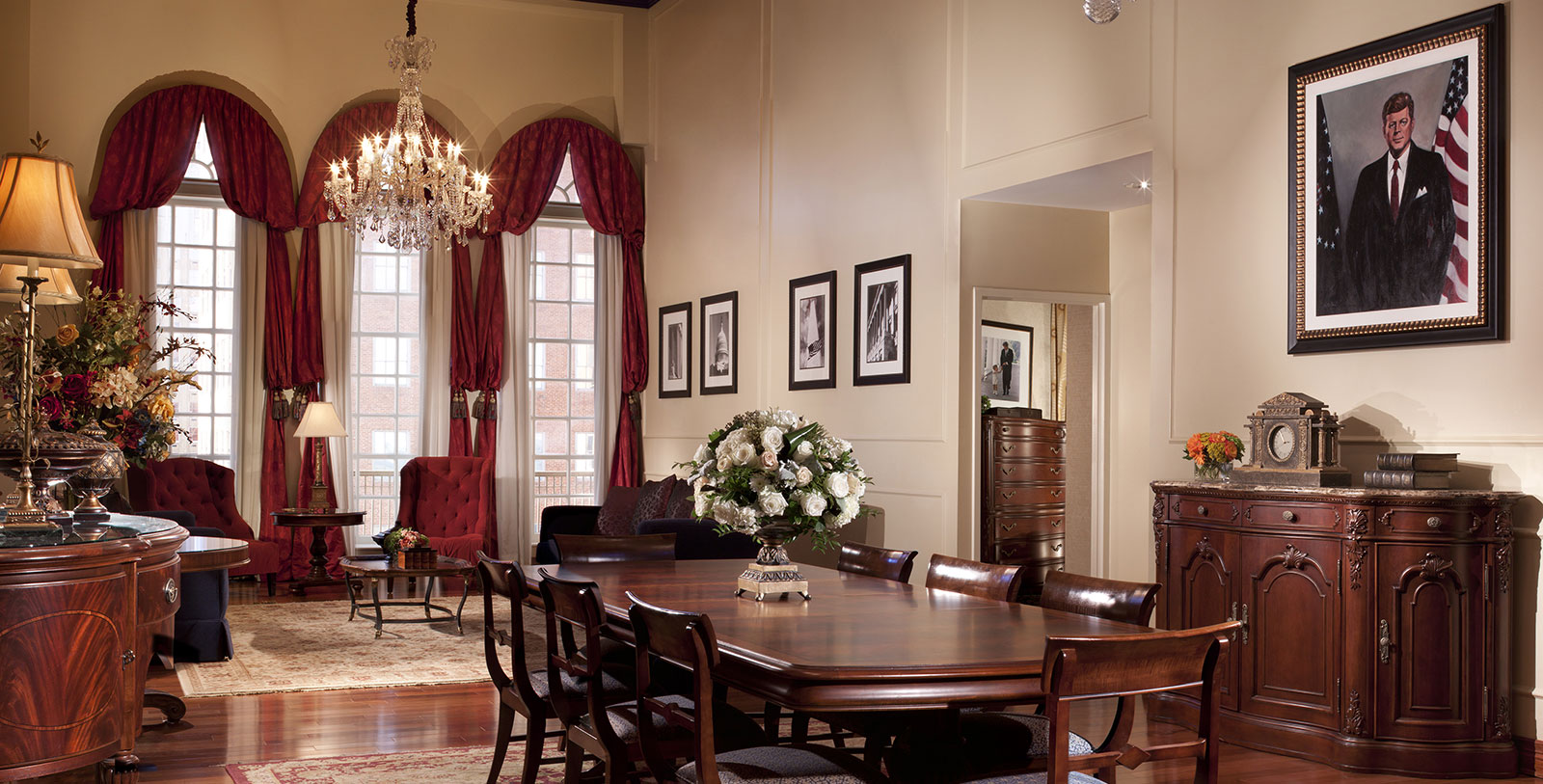 a dining room with a table and chairs
