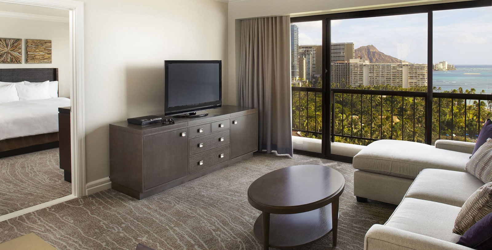 a living room with a television and a couch