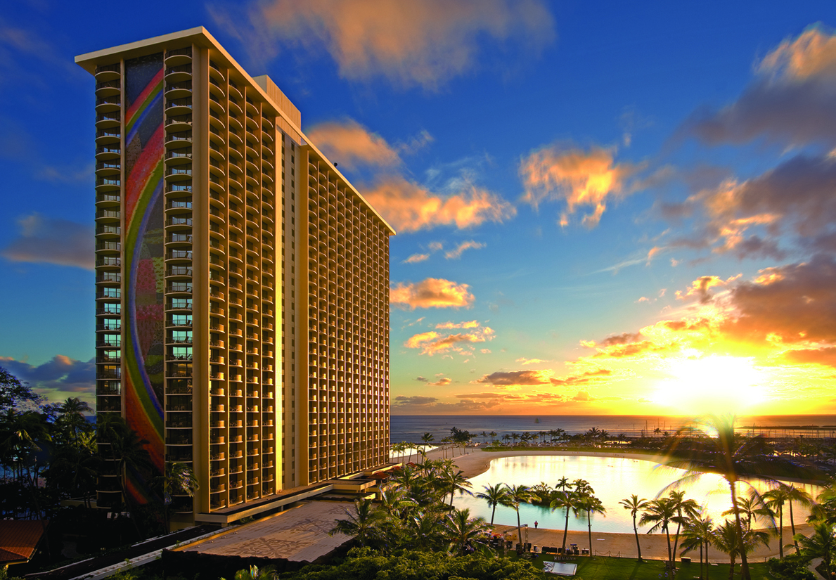 a large building next to a body of water