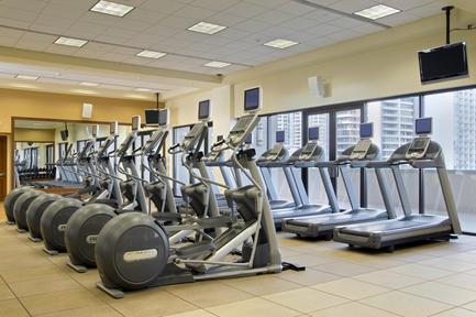 a room with treadmills and exercise machines