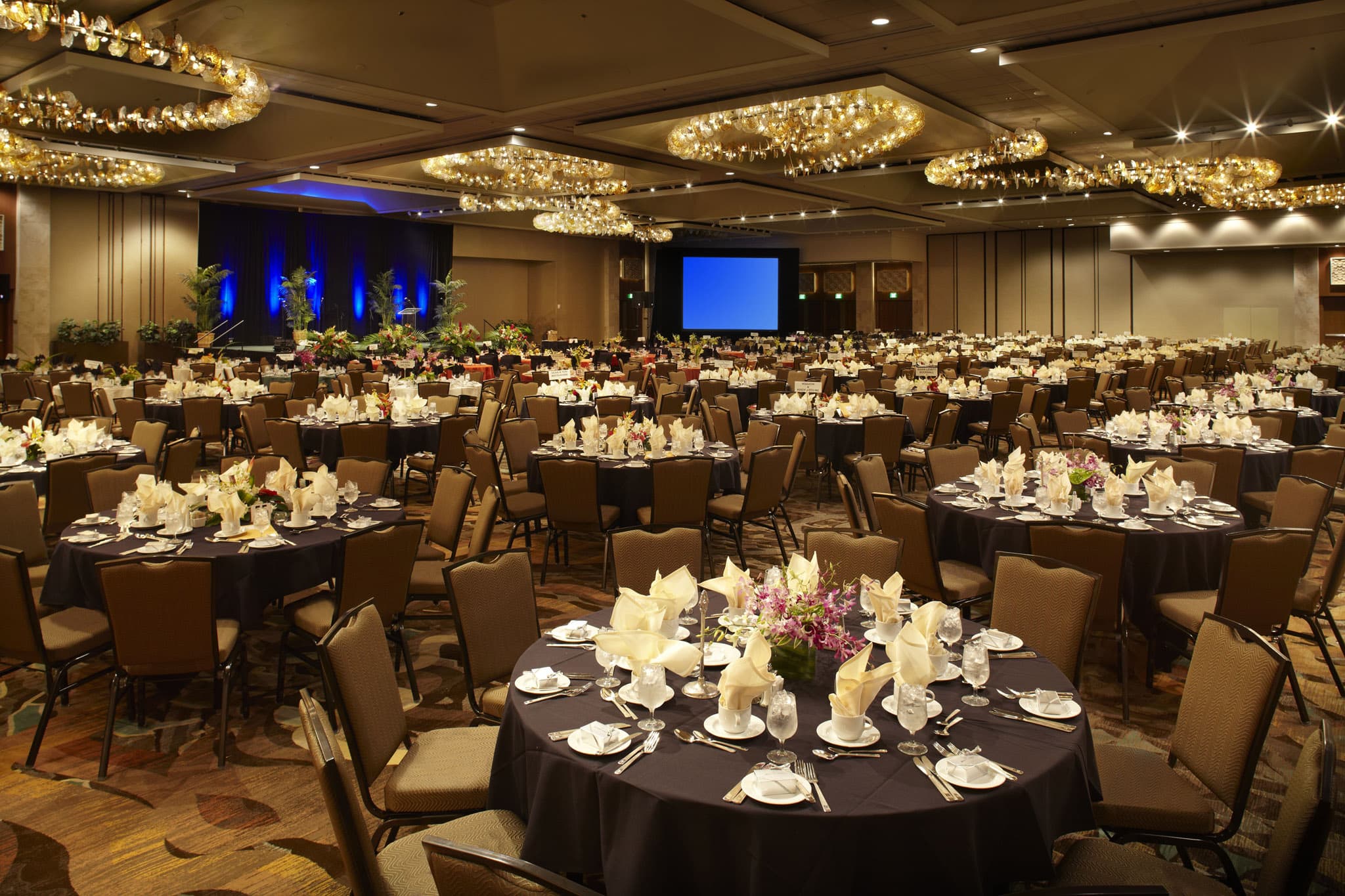 a large room with tables and chairs