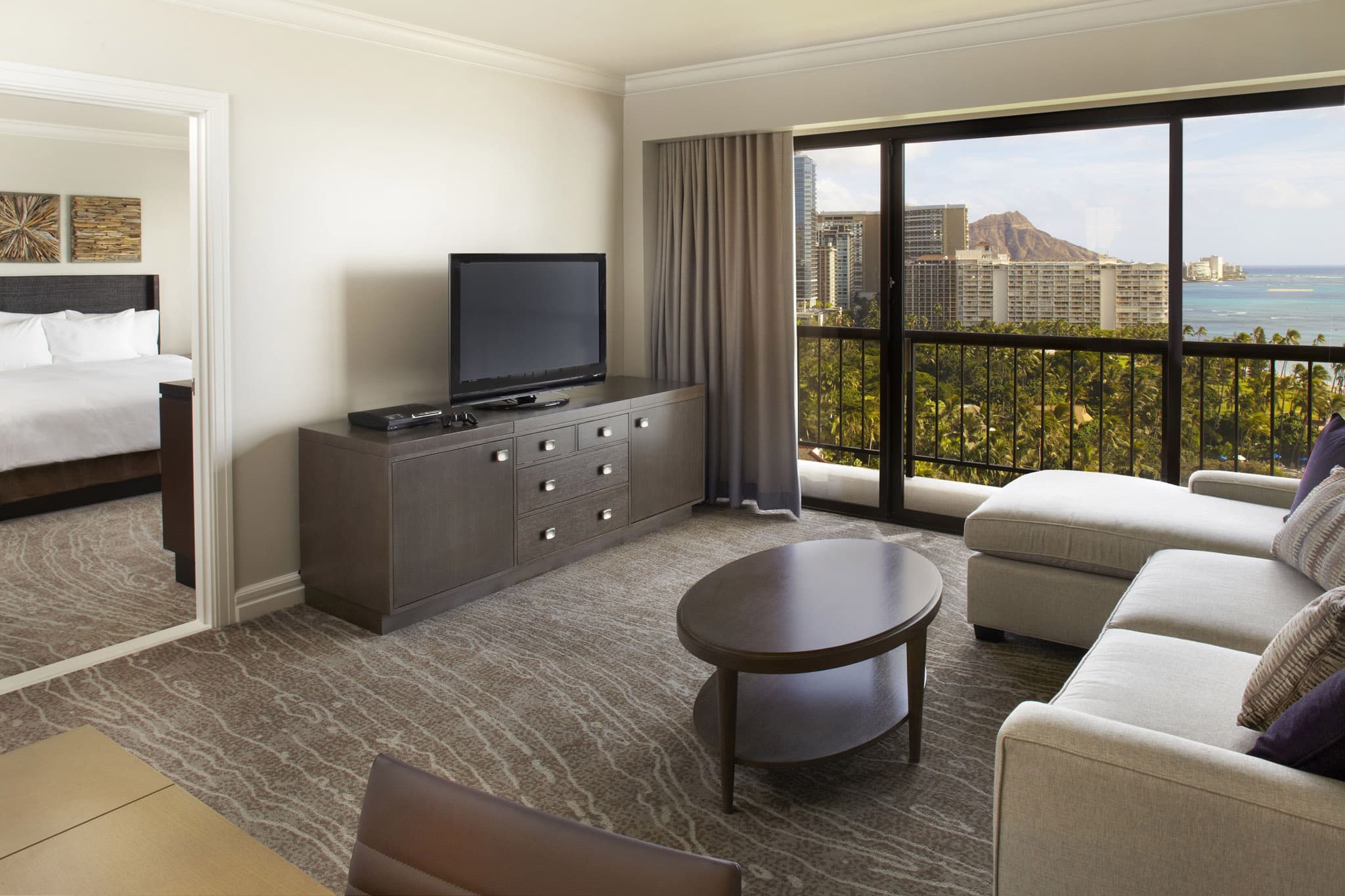 a living room with a television and a couch