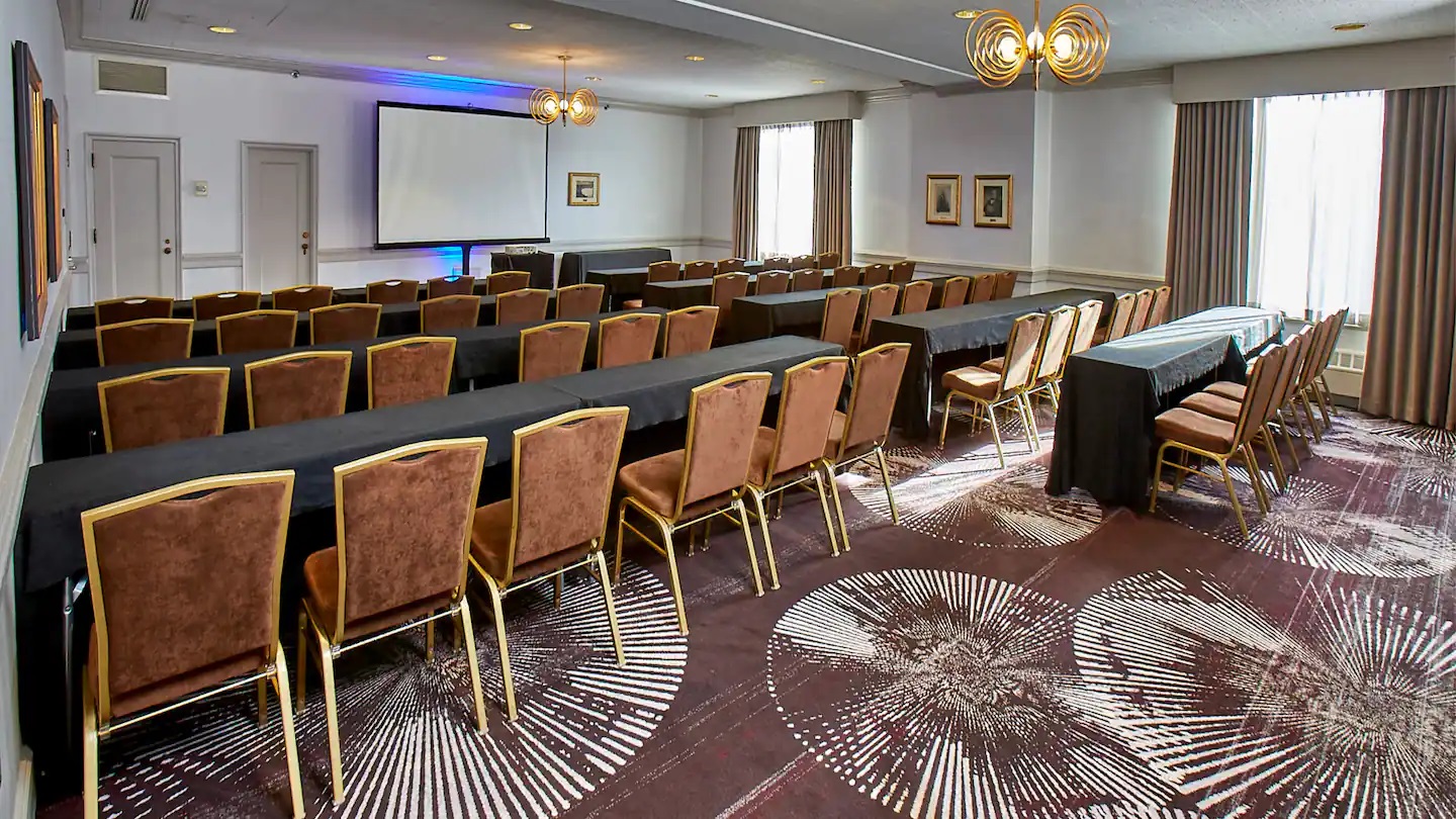 a room with tables and chairs