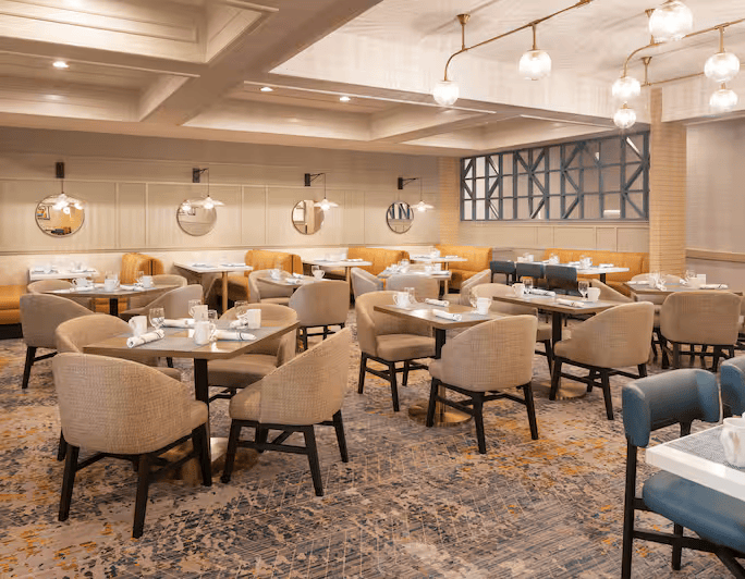 a room with tables and chairs