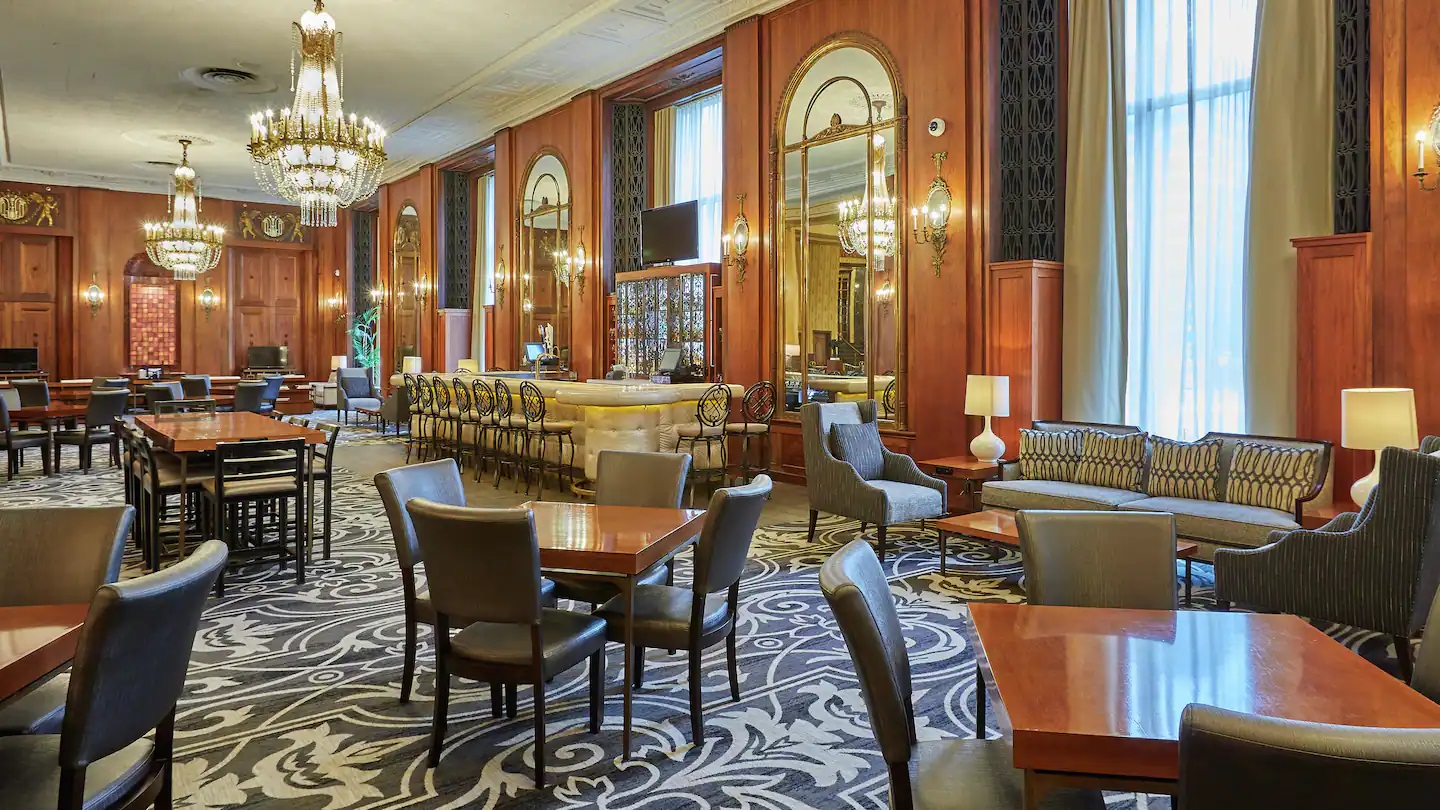 a room with tables and chairs