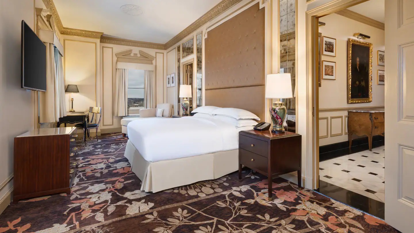 a room with a bed and a table