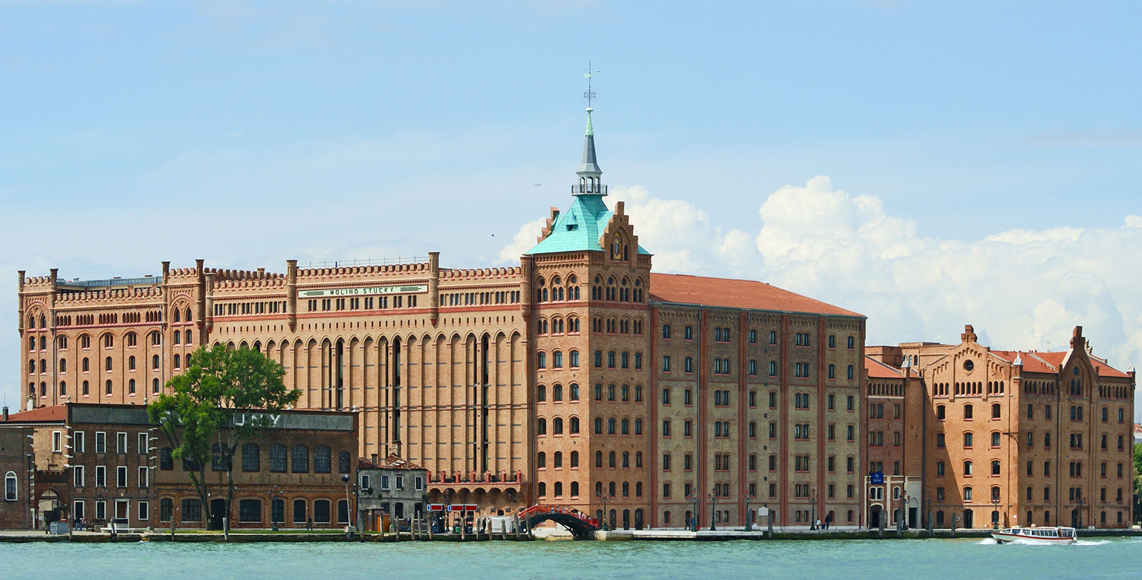 a large building next to water