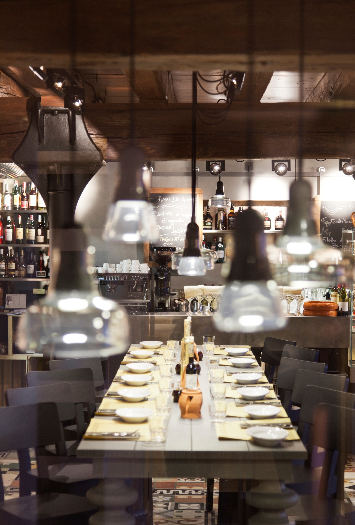 a table with plates and bottles on it