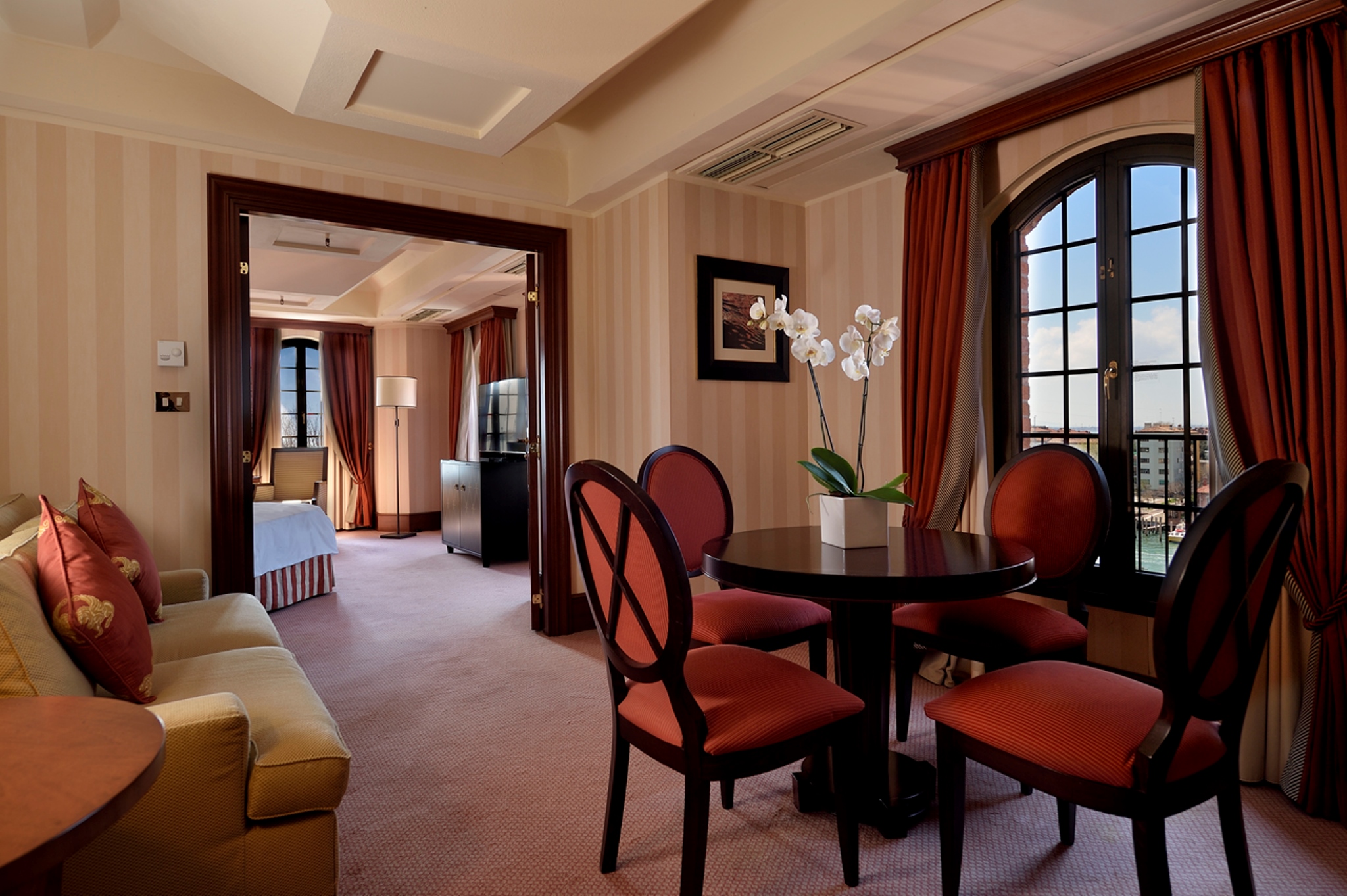 a room with a table and chairs