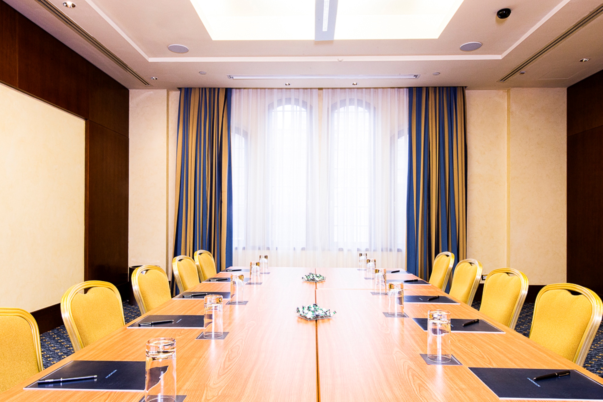 a room with a table and chairs