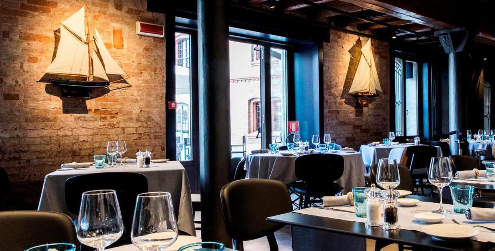 a restaurant with tables and chairs