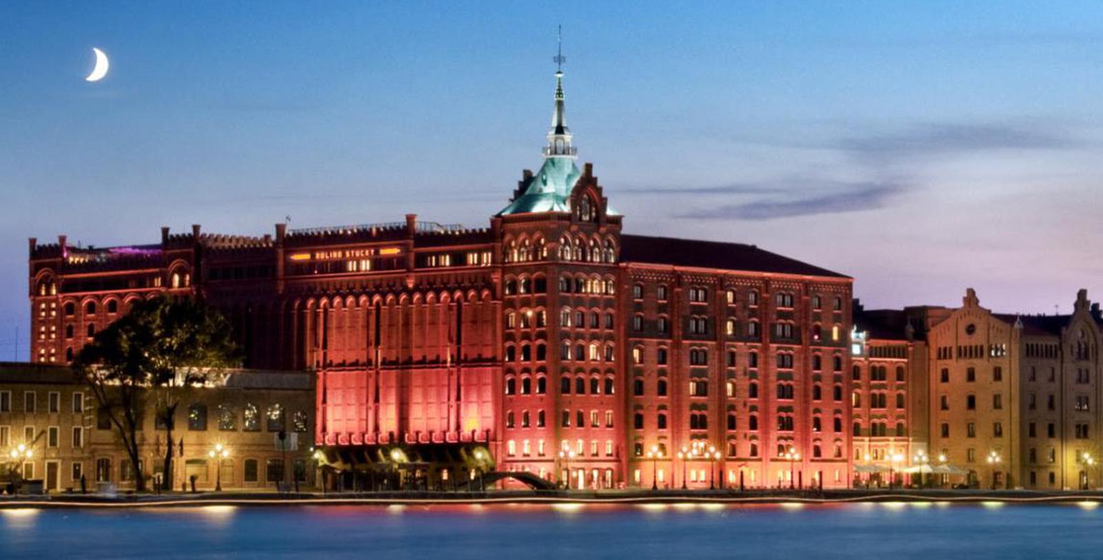 a building with lights on the side of it