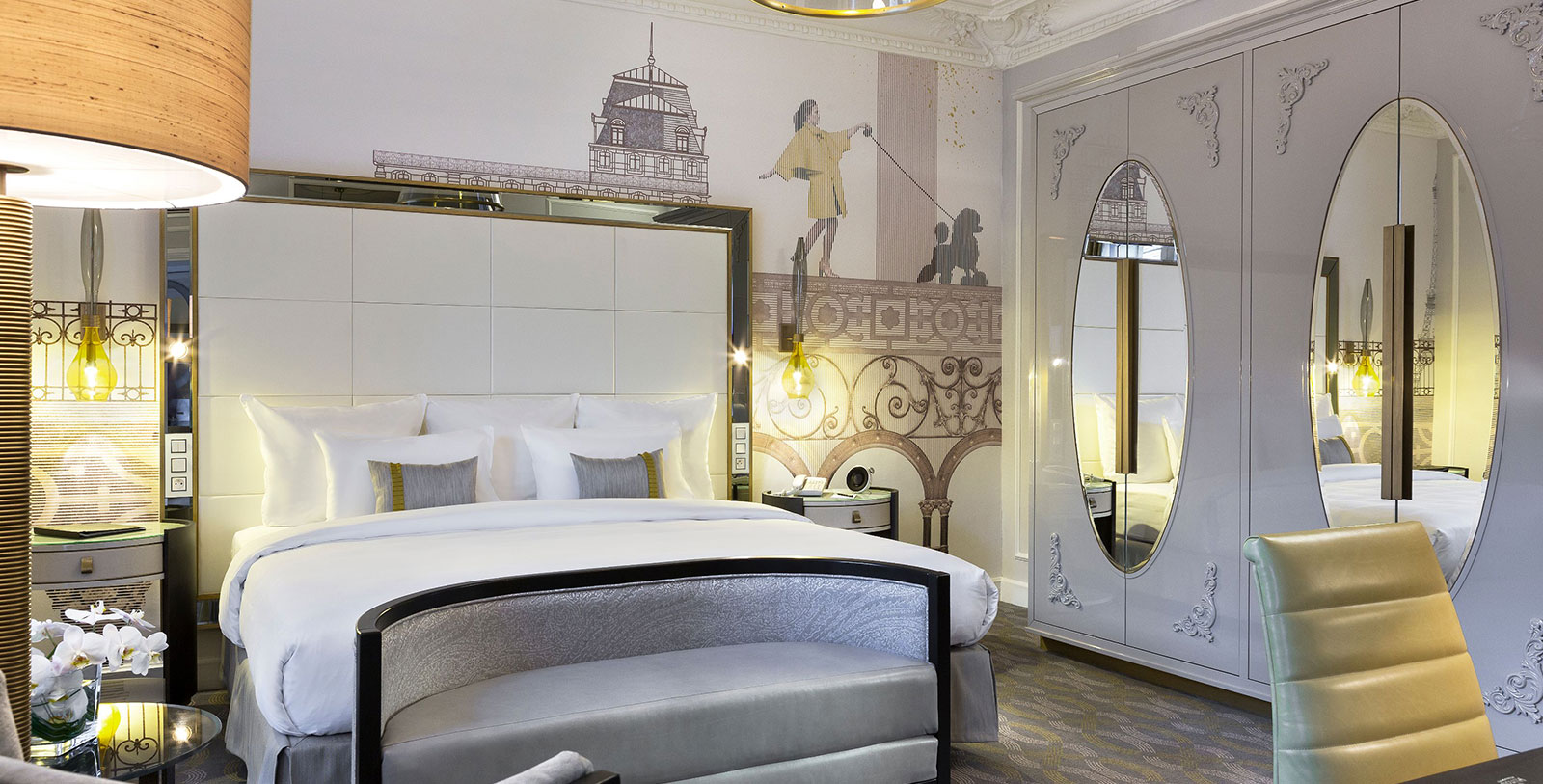 a bedroom with a bed and a mirror