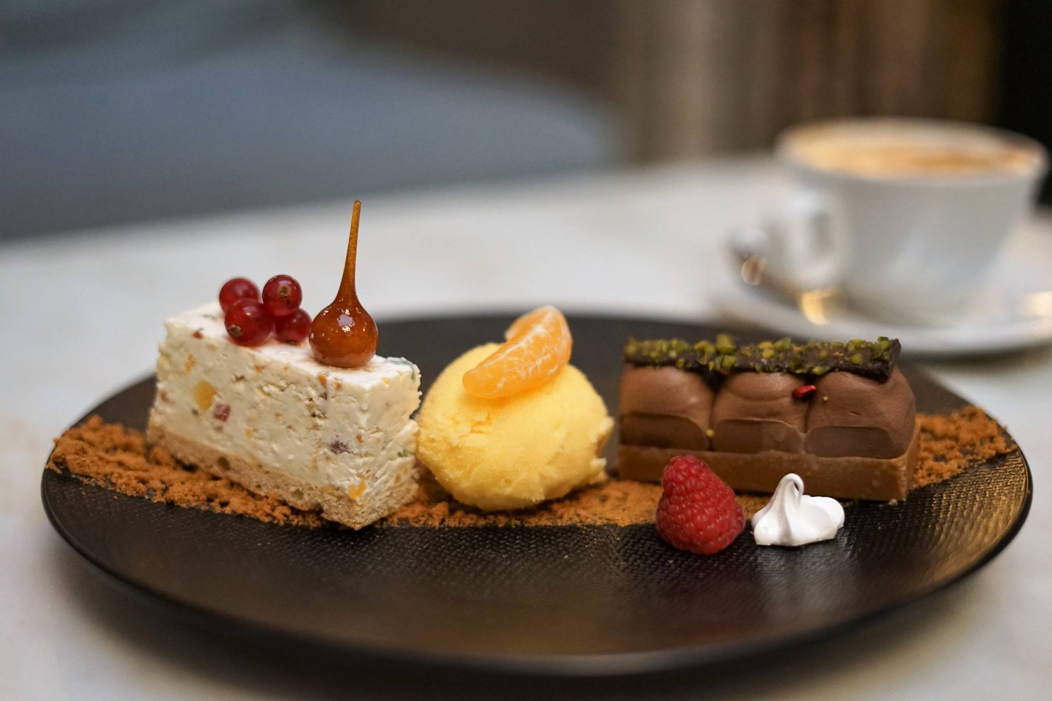 a plate of desserts on a table