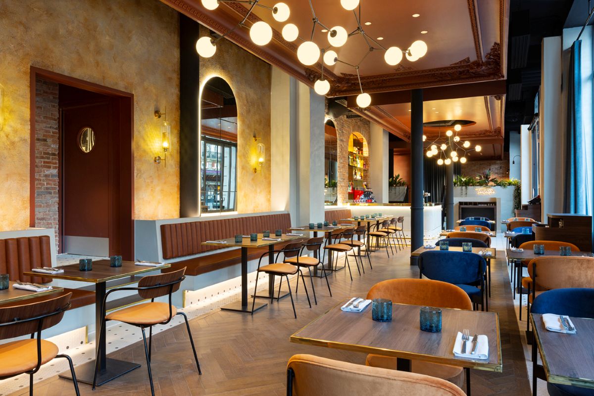 a restaurant with tables and chairs
