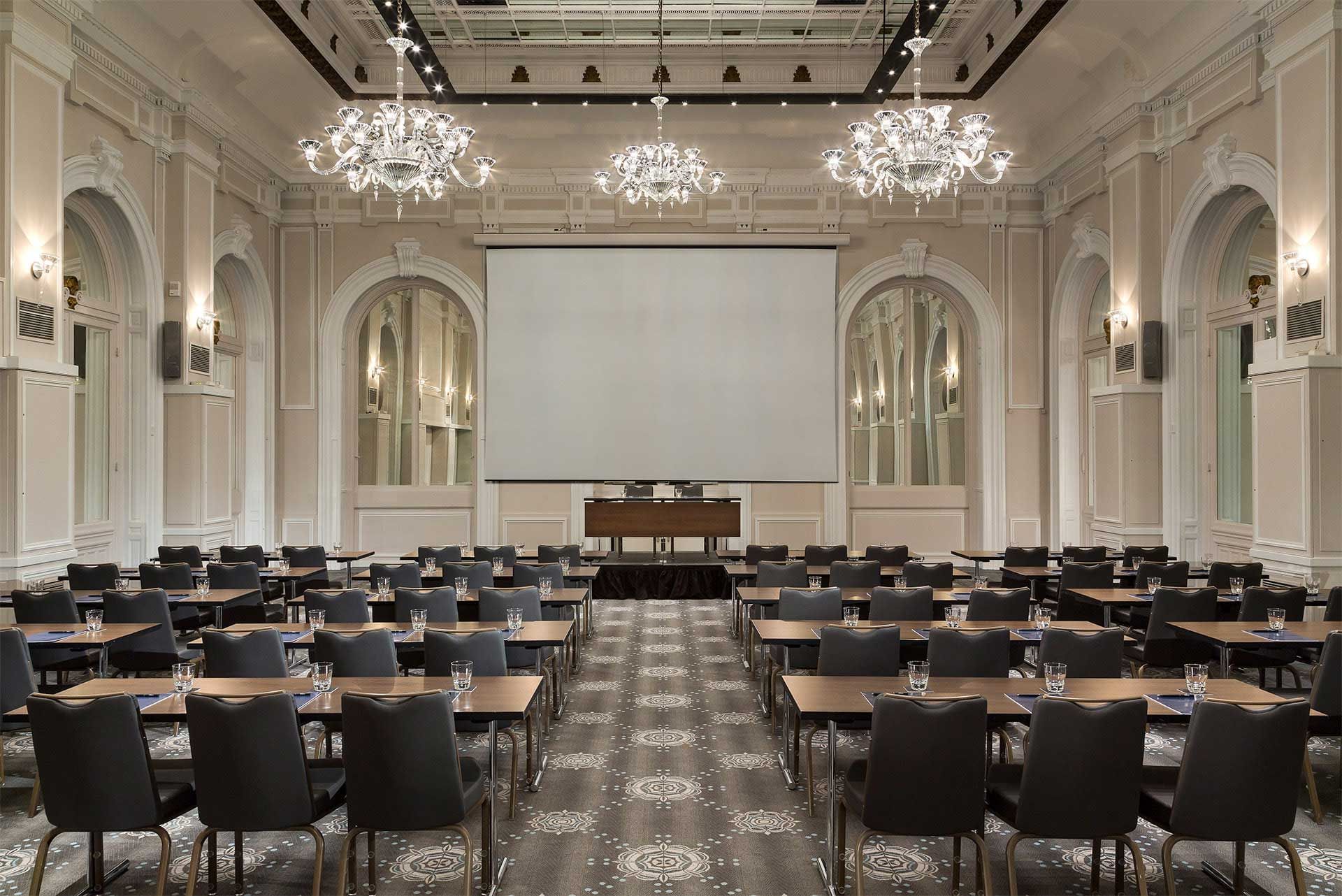 a room with tables and chairs