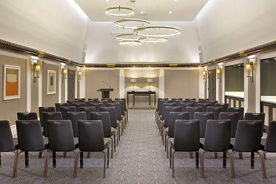 a room with chairs and a podium