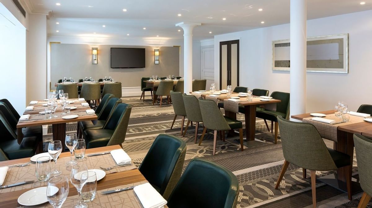a room with tables and chairs