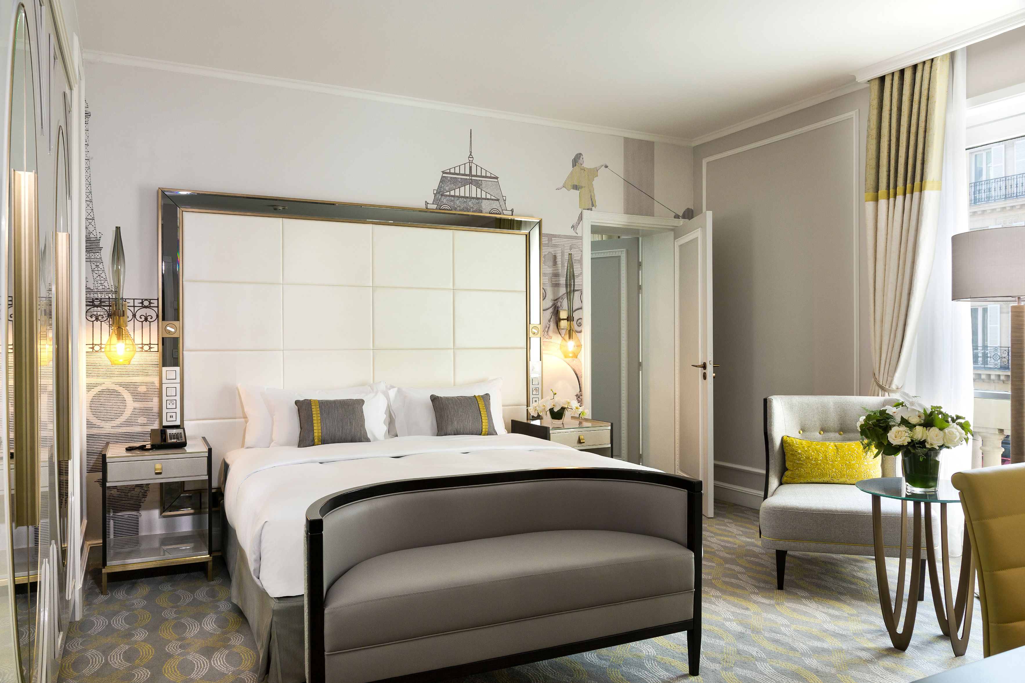 a bedroom with a bed and a chair