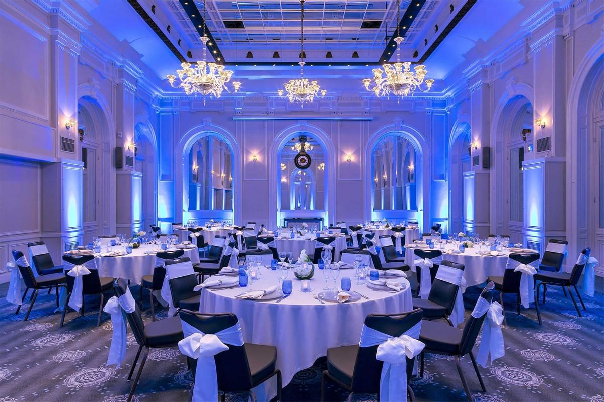 a room with tables and chairs