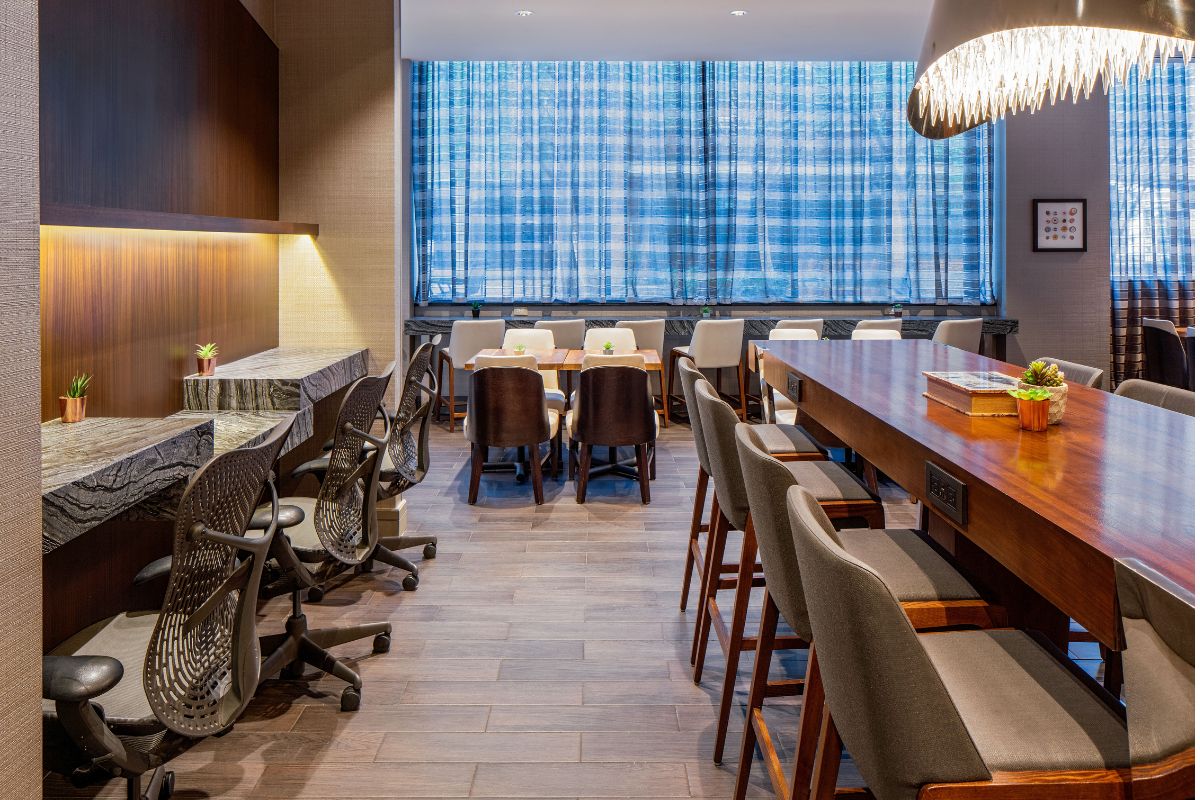 a room with chairs and tables