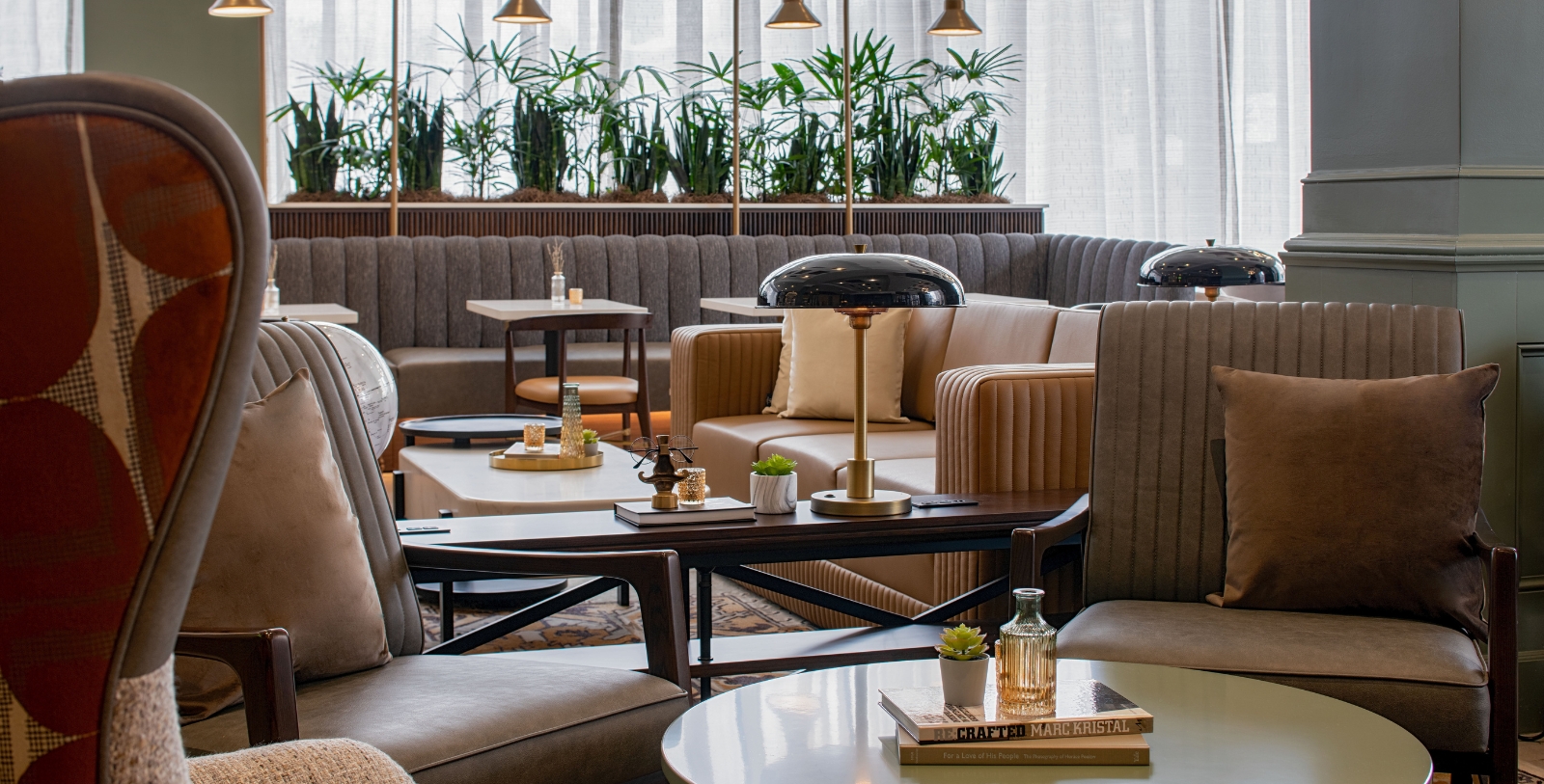 a room with couches and tables