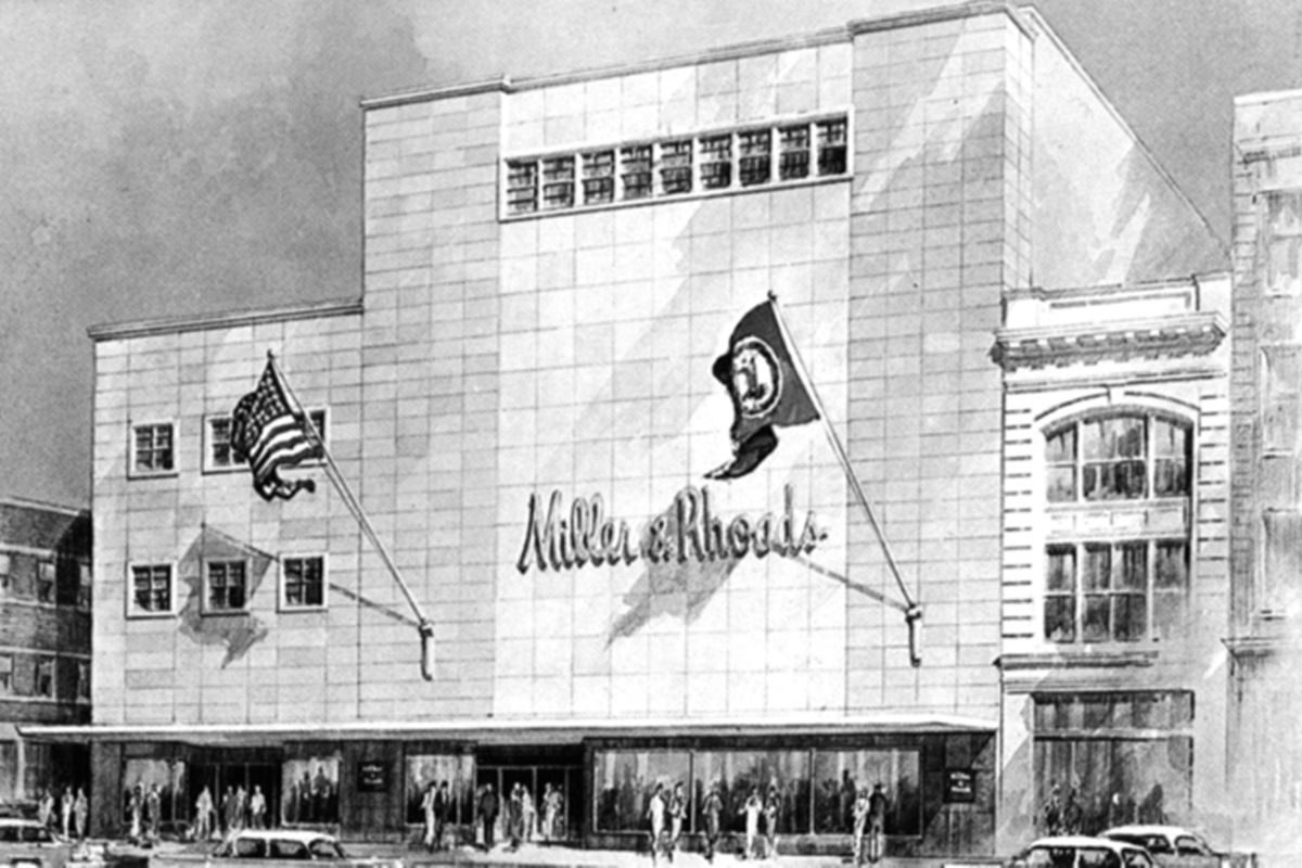 a building with flags on the side