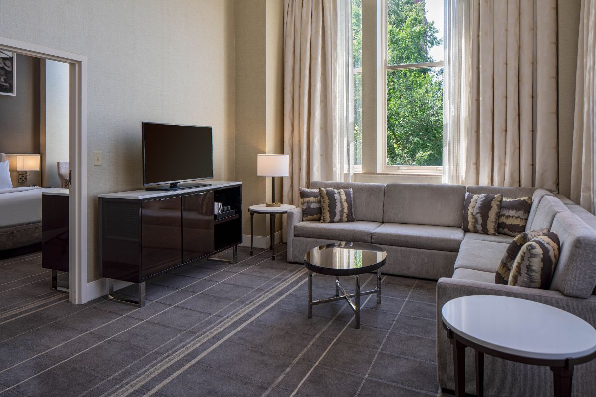 a living room with a couch and a tv