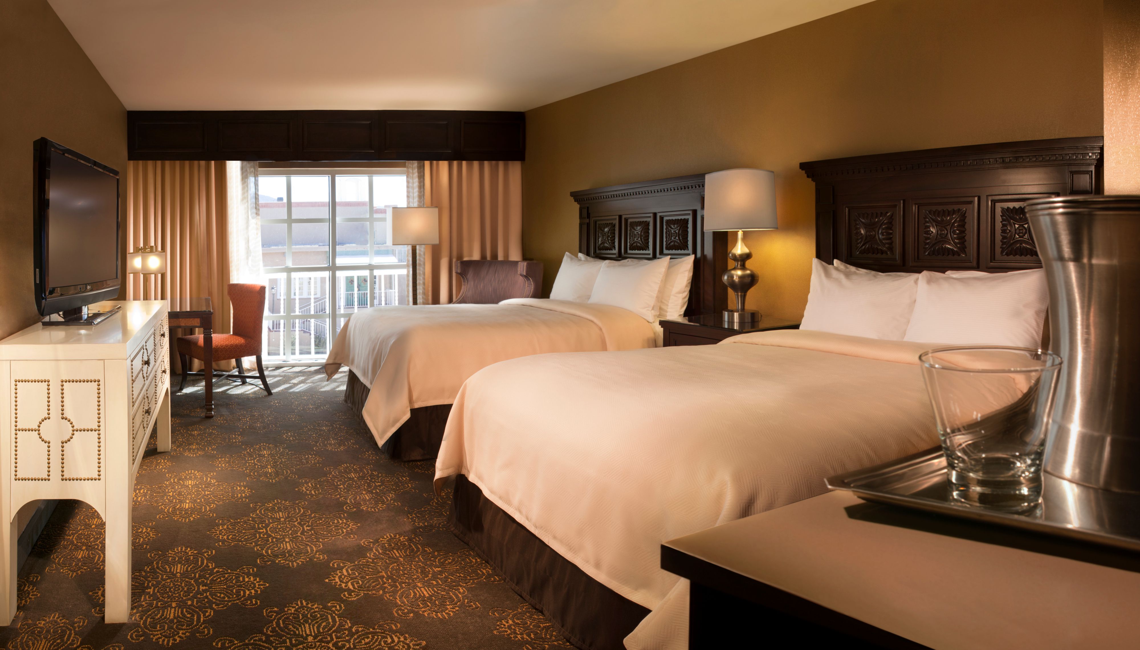 a hotel room with two beds