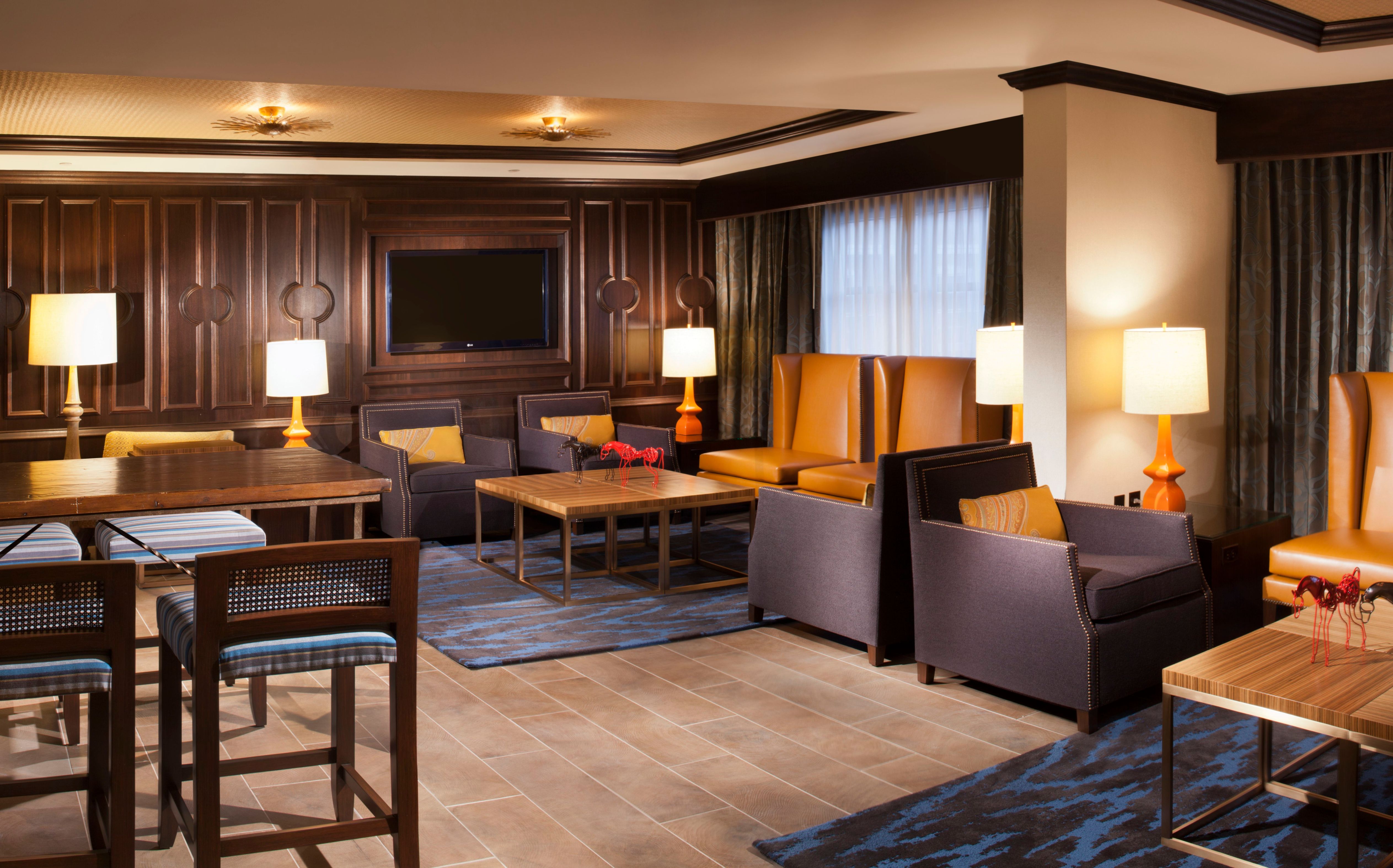 a room with a television and couches