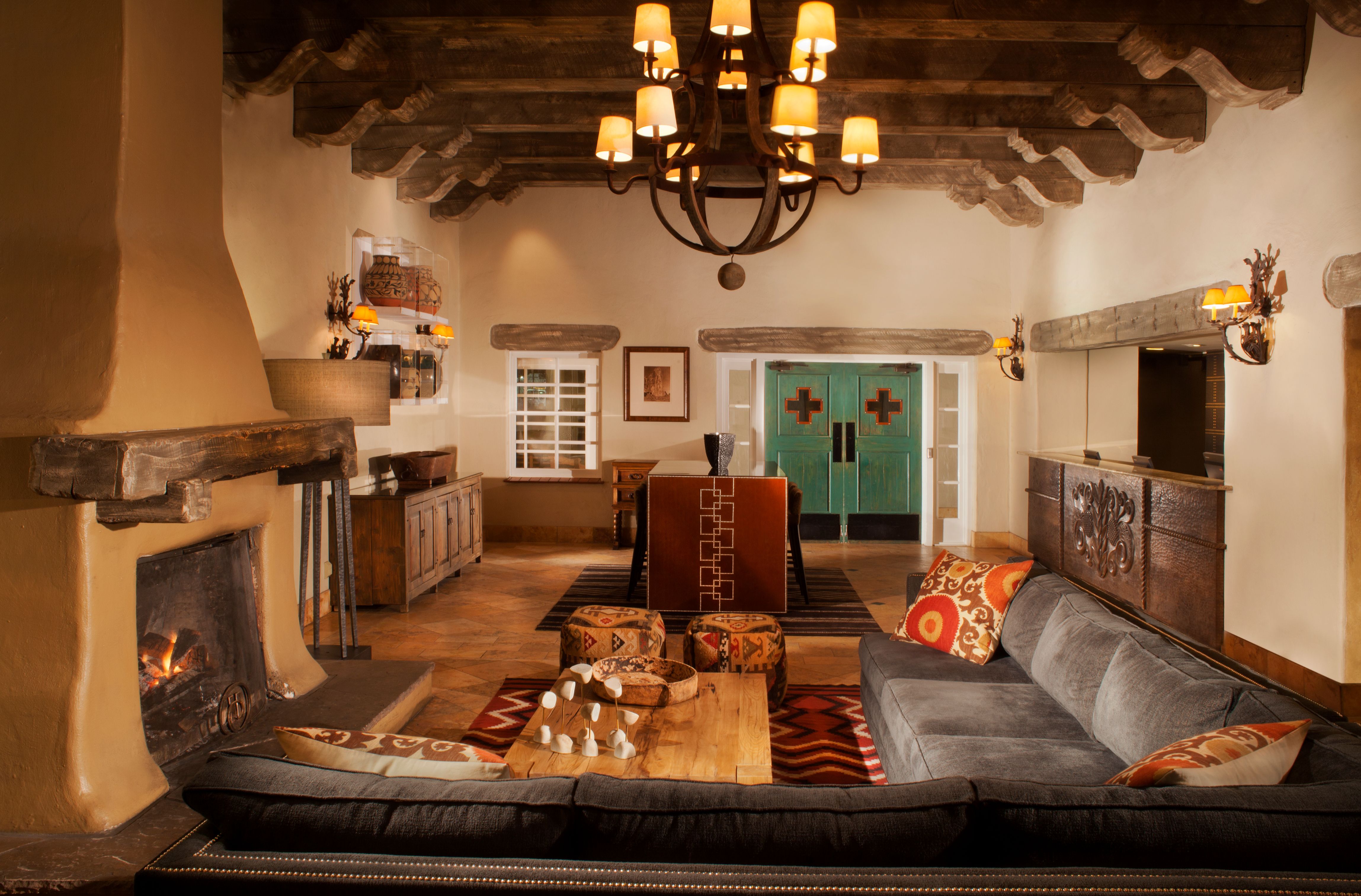 a living room with a fireplace and a couch