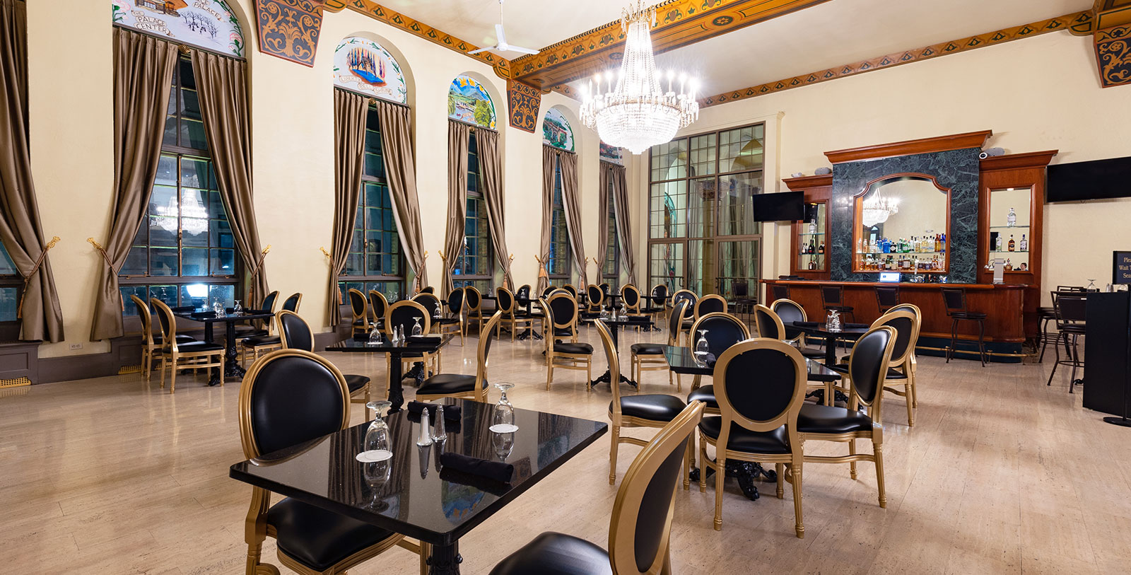 a room with tables and chairs