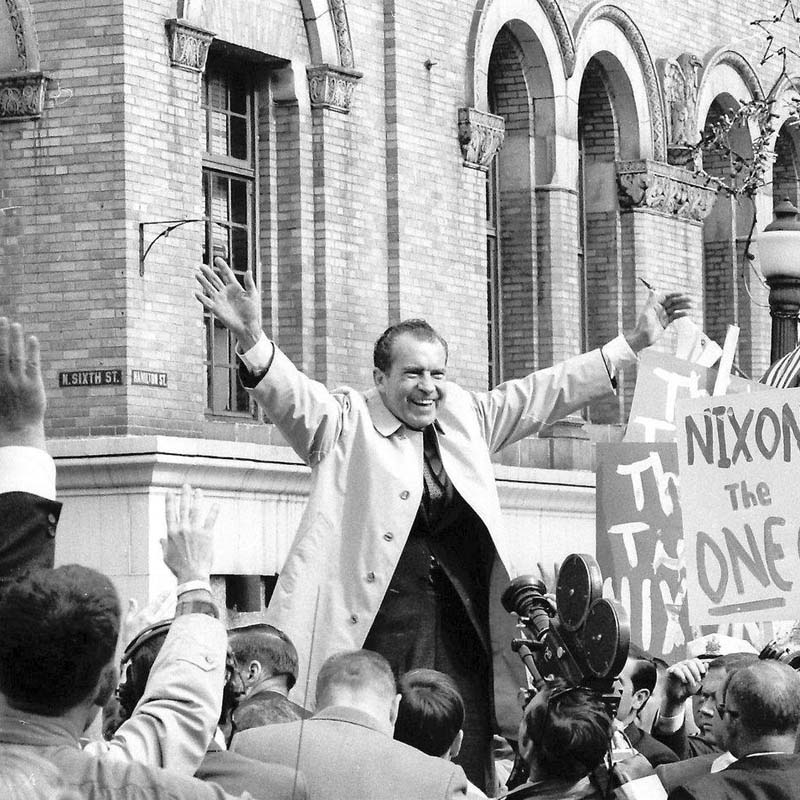 a man standing in front of a crowd