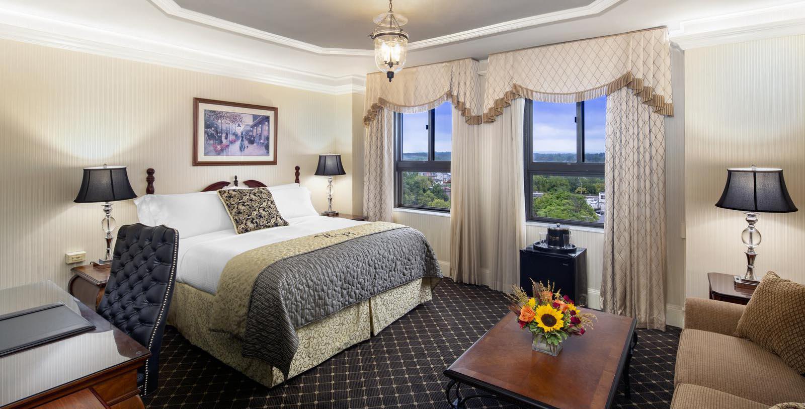 a bedroom with a bed and a coffee table