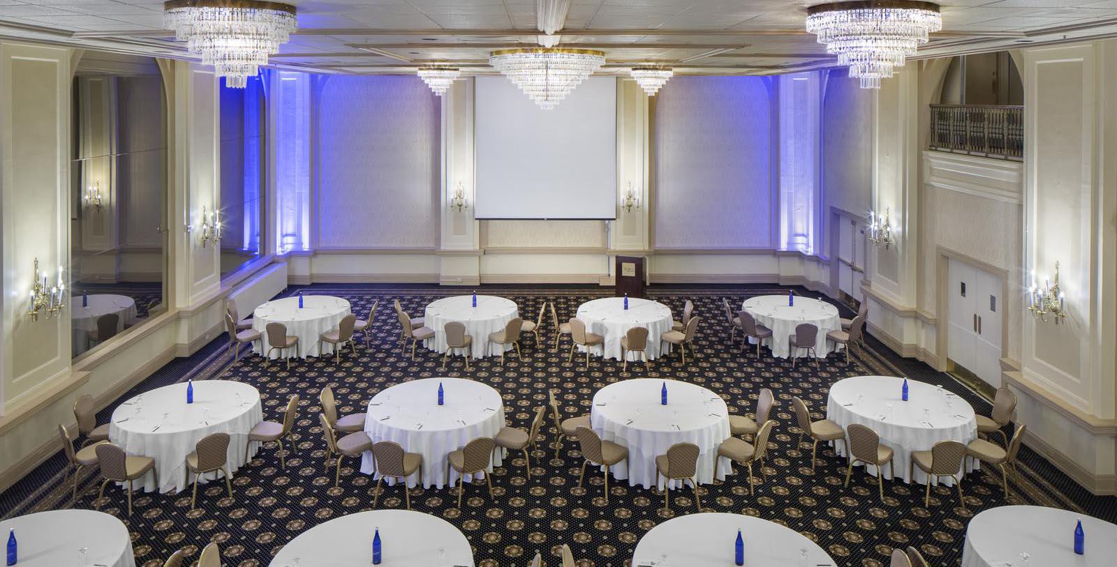 a room with tables and chairs