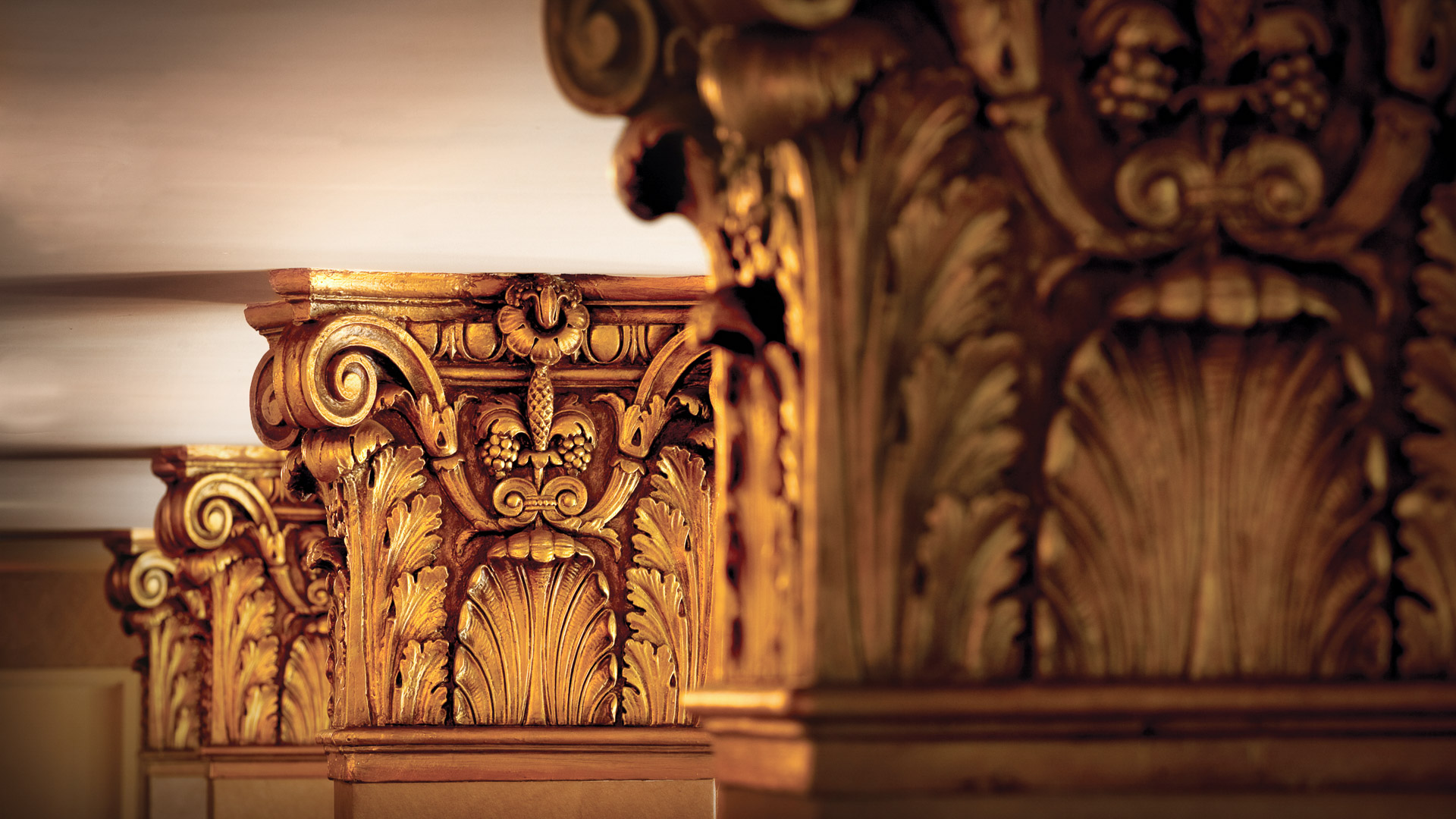 a close up of a gold pillar