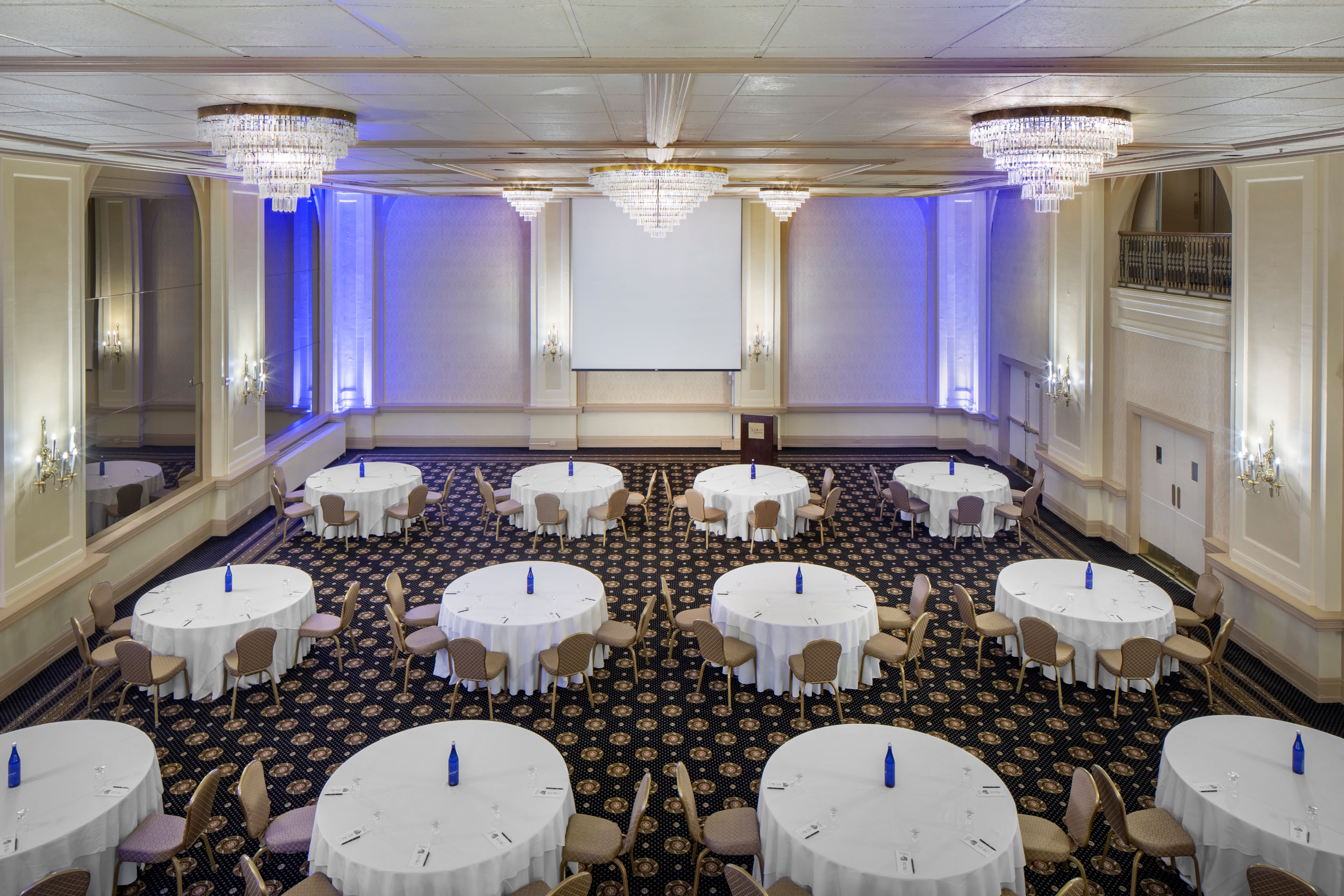 a room with tables and chairs
